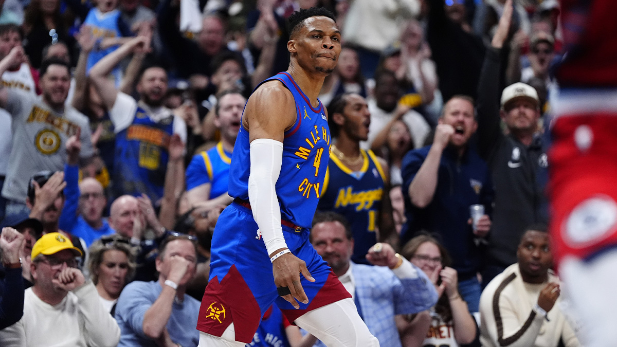 Nuggets guard Russell Westbrook (4) reacts after a three point score in the second quarter against the LA Clippers during game seven of first round for the 2025 NBA Playoffs at Ball Arena with the Thunder logo in the background