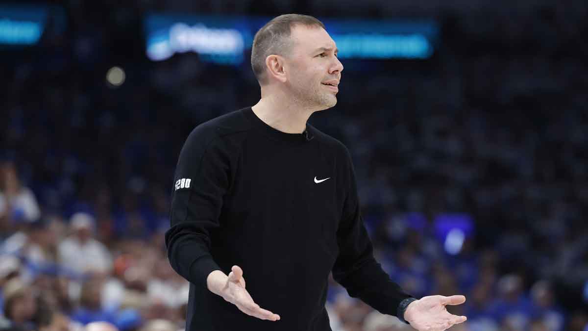 Nuggets head coach David Adelman reacts
