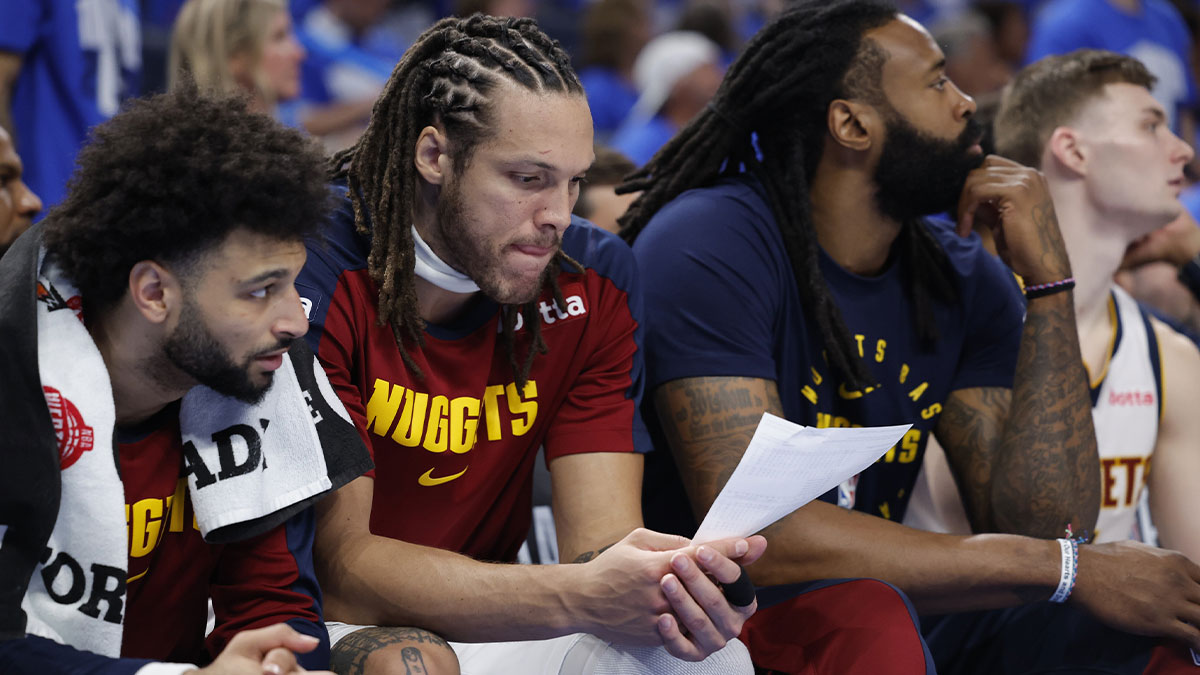 Denver Nuggets forward Aaron Gordon (32) looks over stats in the fourth quarter against the Denver Nuggets of game seven of the second round for the 2025 NBA Playoffs at Paycom Center.
