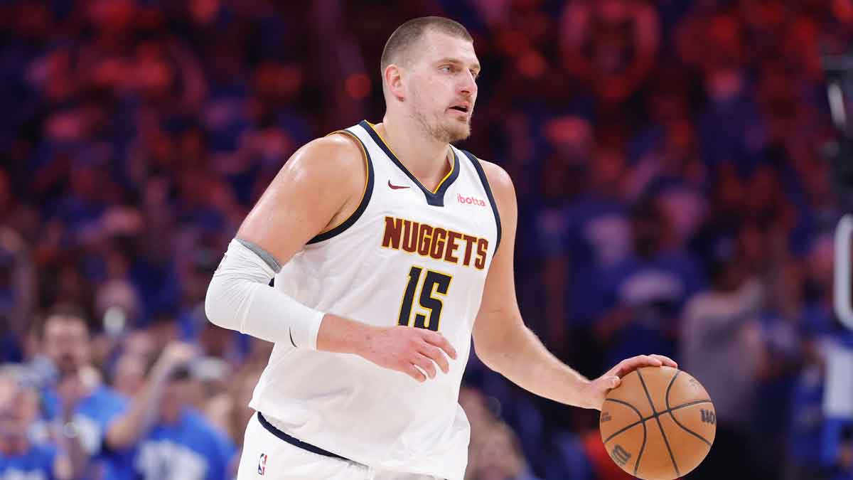 Denver Nuggets center Nikola Jokic (15) dribbles down the court against the Oklahoma City Thunder in the second quarter during game seven of the second round for the 2025 NBA Playoffs at Paycom Center