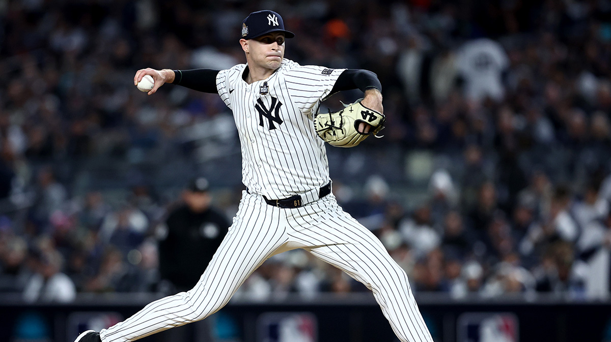 Oct 28, 2024; New York, New York, USA; New York Yankees pitcher Jake Cousins (61) throws during the sixth inning against the Los Angeles Dodgers in game three of the 2024 MLB World Series at Yankee Stadium. Mandatory Credit: Wendell Cruz-Imagn Images