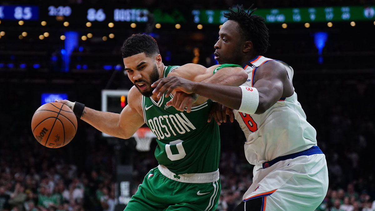 New York Knicks forward OG Anunoby (8) defends against Boston Celtics forward Jayson Tatum (0) in the fourth quarter during game two of the second round for the 2025 NBA Playoffs at TD Garden.