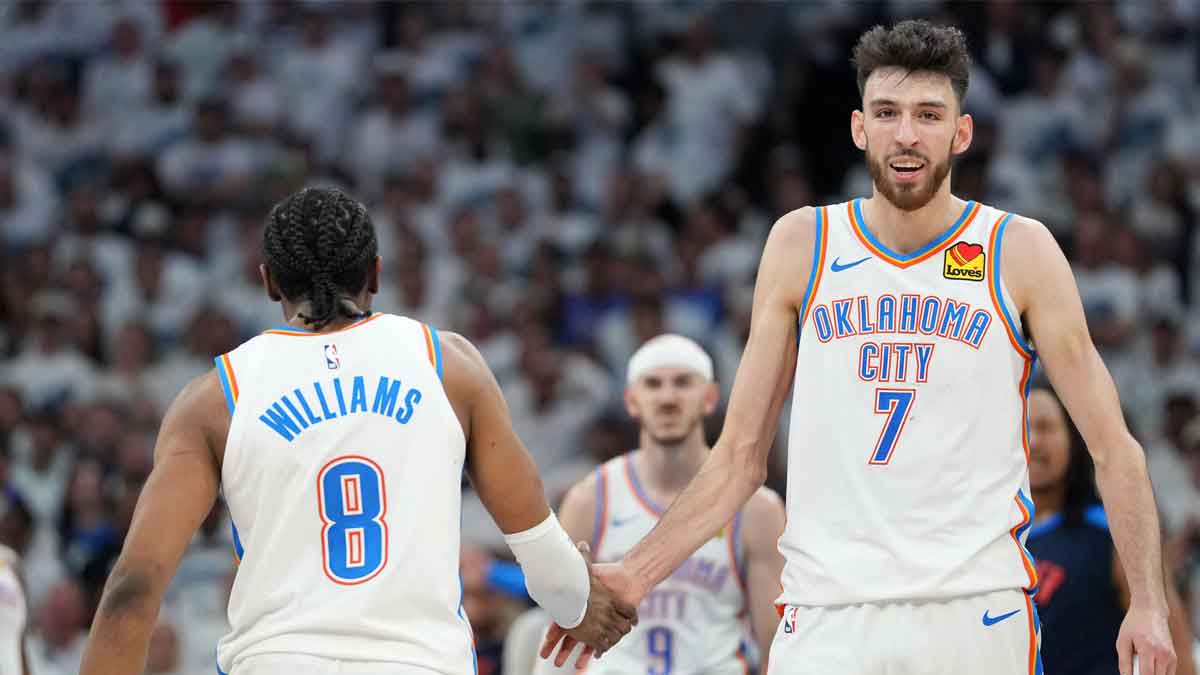 Oklahoma City Thunder forward Chet Holmgren (7) reacts with forward Jalen Williams (8) in the second half during game four of the western conference finals for the 2025 NBA Playoffs at Target Center.