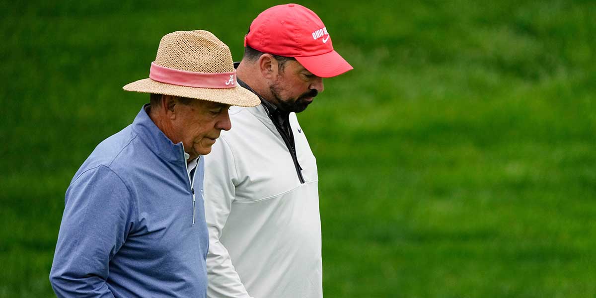 Nick Saban and Ryan Day walk the 14th fairway during the Workday Golden Bear Pro-Am at Muirfield Village Golf Club in Dublin, Ohio on May 28, 2025.