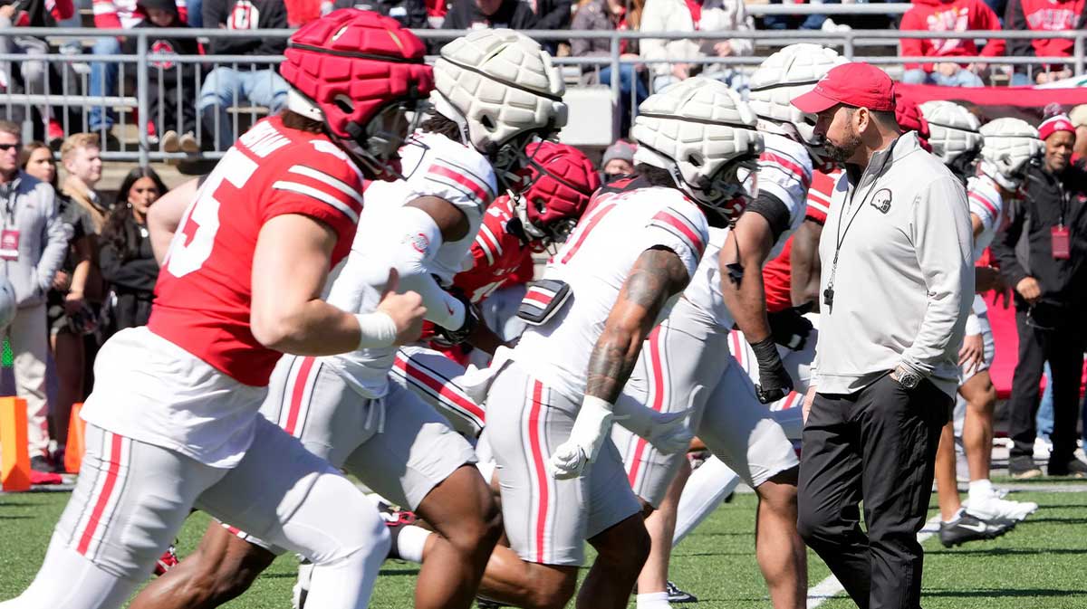 Ohio State Buckeye head coach Ryan Day watches his team warm up before the start of the spring game at Ohio Stadium on April 12, 2025.