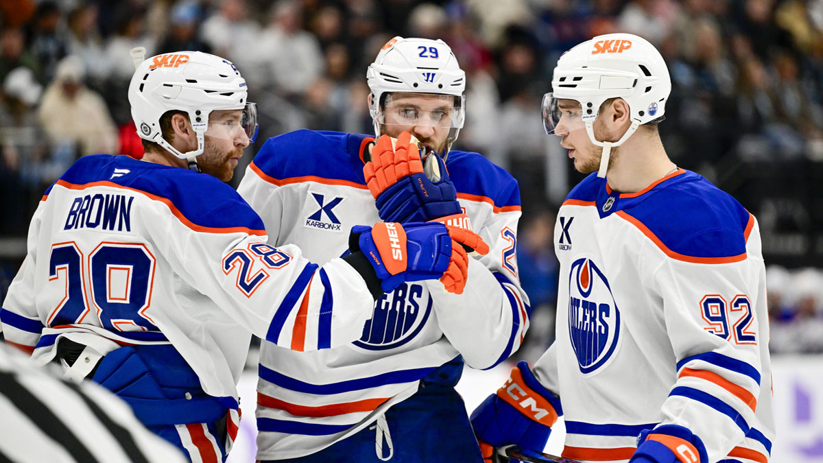 Edmonton Oilers right wing Connor Brown (28), center Leon Draisaitl (29), and right wing Vasily Podkolzin (92) on the ice against the Utah Hockey Club during the third period at the Delta Center.