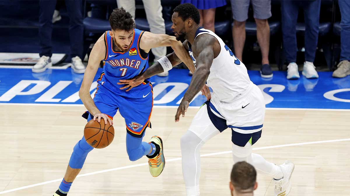 Oklahoma City Thunder forward Jalen Williams (8) drives to the basket against Minnesota Timberwolves forward Julius Randle (30) in game five of the western conference finals for the 2025 NBA Playoffs at Paycom Center.