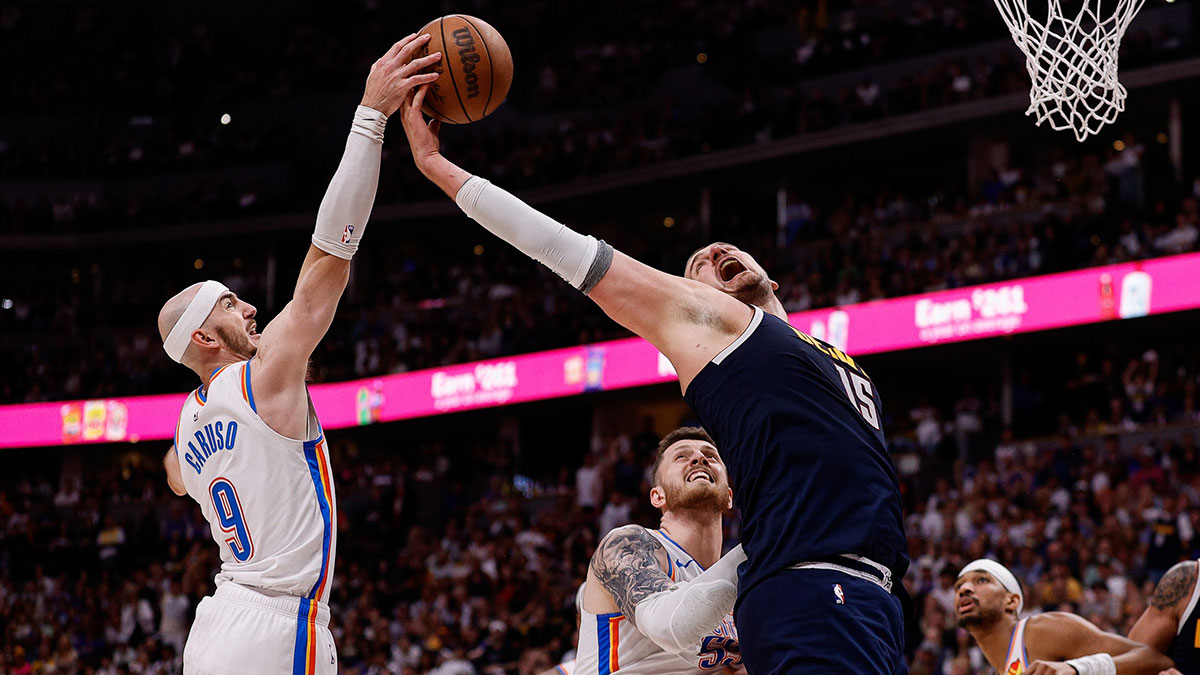 Oklahoma City Thunder guard Alex Caruso (9) and Denver Nuggets center Nikola Jokic (15) battle for a rebound as center Isaiah Hartenstein (55) defends in the fourth quarter during game four of the second round of the 2025 NBA Playoffs at Ball Arena.