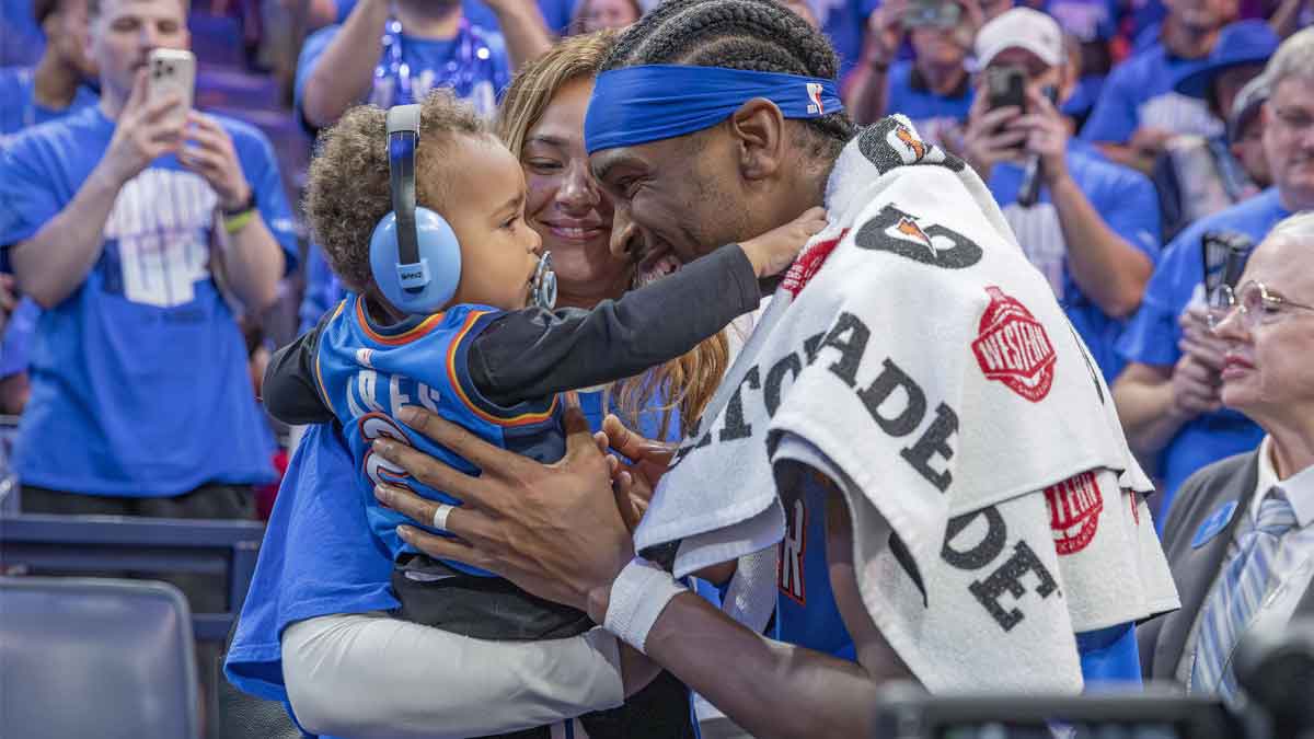 Oklahoma City Thunder guard Shai Gilgeous-Alexander (2) hugs his son and wife after his team defeated the Denver Nuggets in game seven of the second round for the 2025 NBA Playoffs at Paycom Center.