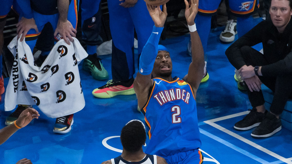 Oklahoma City Thunder guard Shai Gilgeous-Alexander (2) shoots against Minnesota Timberwolves forward Jaden McDaniels (3) in the fourth quarter during game two of the western conference finals for the 2025 NBA Playoffs at Paycom Center.