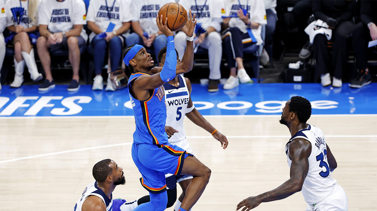 Oklahoma City Thunder guard Shai Gilgeous-Alexander (2) shoots the ball against Minnesota Timberwolves guard Mike Conley (10) during the first quarter in game five of the western conference finals for the 2025 NBA Playoffs at Paycom Center.
