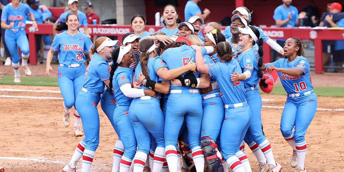 Ole Miss Rebels pitcher Aliyah Binford (4) and her teammates celebrate after the last out against the Arkansas Razorbacks in game three of the Fayetteville Super Regional at Bogle Park.