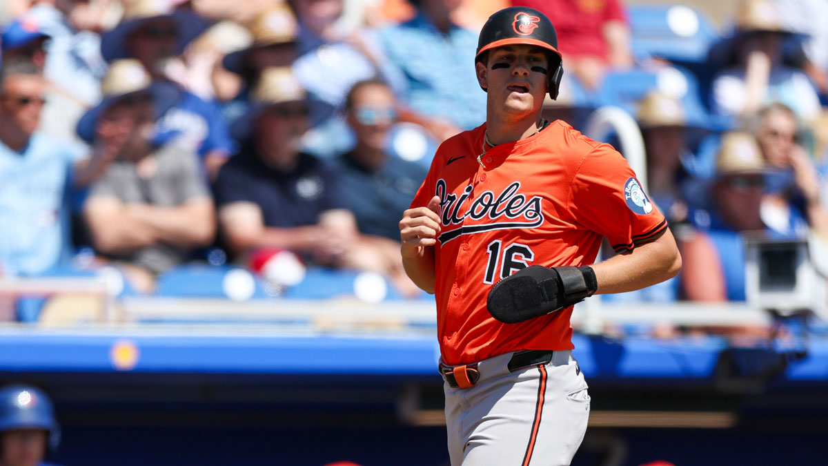 Baltimore Orioles third baseman Coby Mayo (16) scores a run against the Toronto Blue Jays in the second inning during spring training at TD Ballpark.