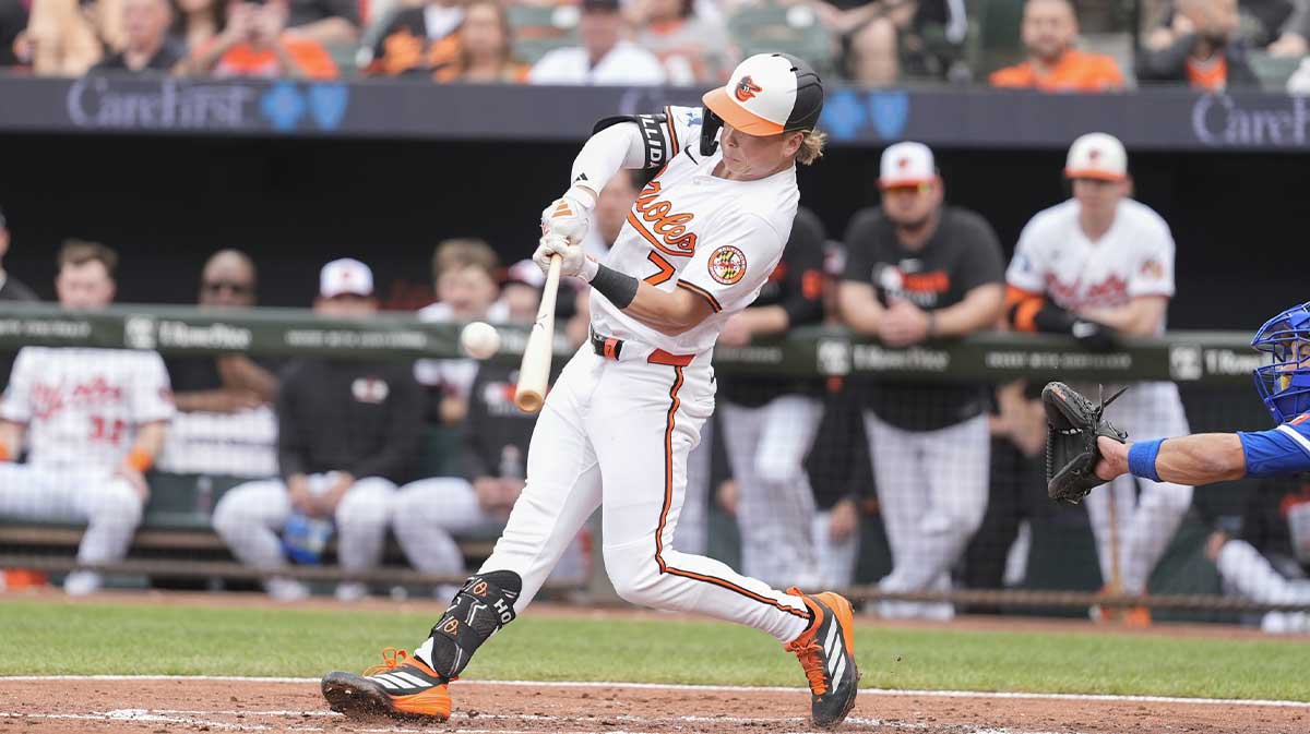 Baltimore Orioles second baseman Jackson Holliday (7) hits a home run against the Kansas City Royals during the second inning at Oriole Park at Camden Yards.