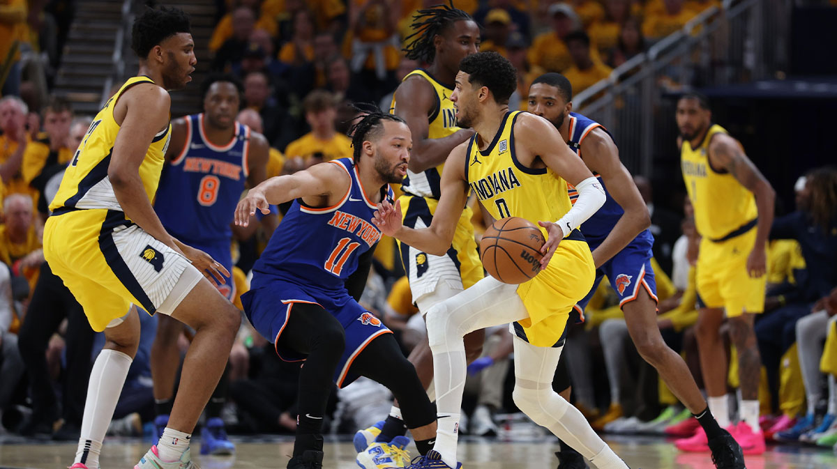 Indiana Pacers guard Tyrese Haliburton (0) drives to the hoop past New York Knicks guard Jalen Brunson (11) during the second quarter of game three of the eastern conference finals for the 2025 NBA Playoffs at Gainbridge Fieldhouse.