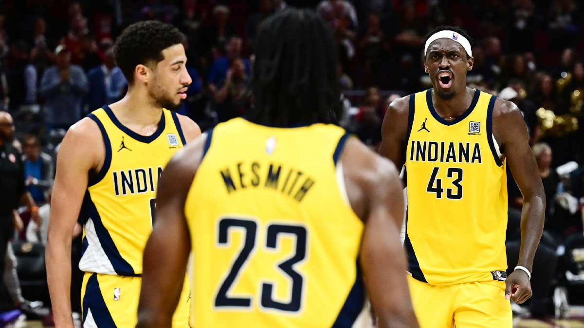 Pacers forward Aaron Nesmith (23) and guard Tyrese Haliburton (0) and forward Pascal Siakam (43) celebrate