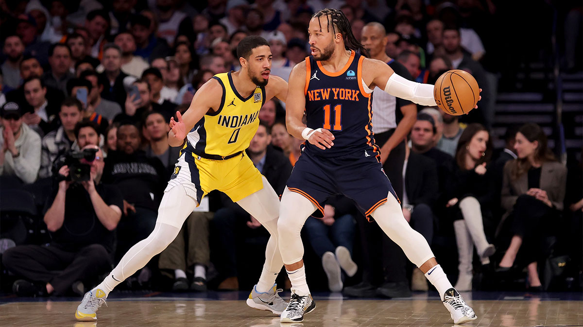 New York Knicks guard Jalen Brunson (11) controls the ball against Indiana Pacers guard Tyrese Haliburton (0) during the first quarter at Madison Square Garden.