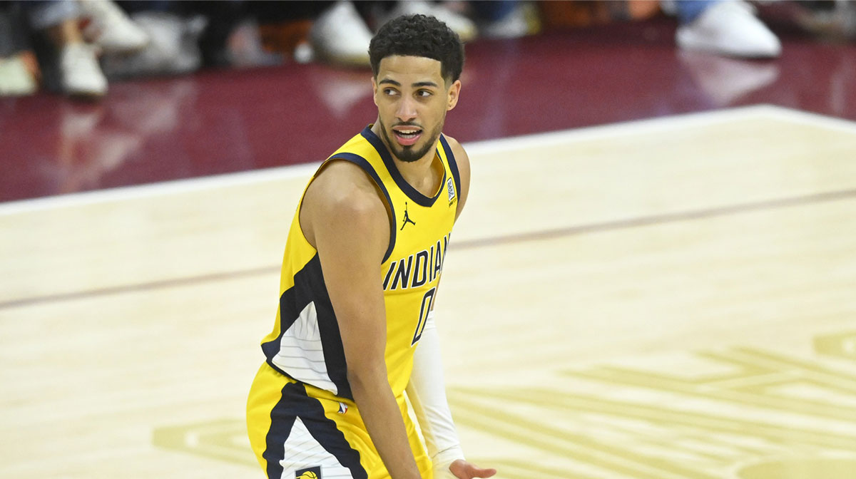 Pacers guard Tyrese Haliburton (0) celebrates his game-winning three-point basket in the fourth quarter during game two of the second round of the 2025 NBA Playoffs against the Cleveland Cavaliers at Rocket Arena with Cavs logo in the background