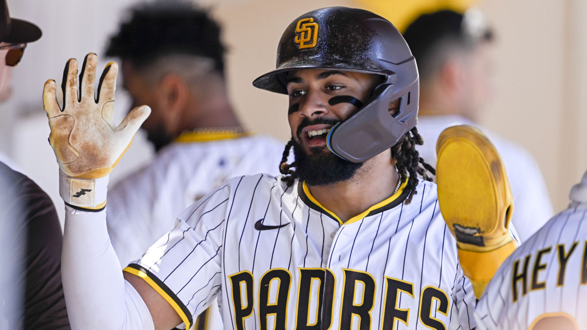 San Diego Padres right fielder Fernando Tatis Jr. (23) is congratulated after scoring during the fifth inning at Petco Park.