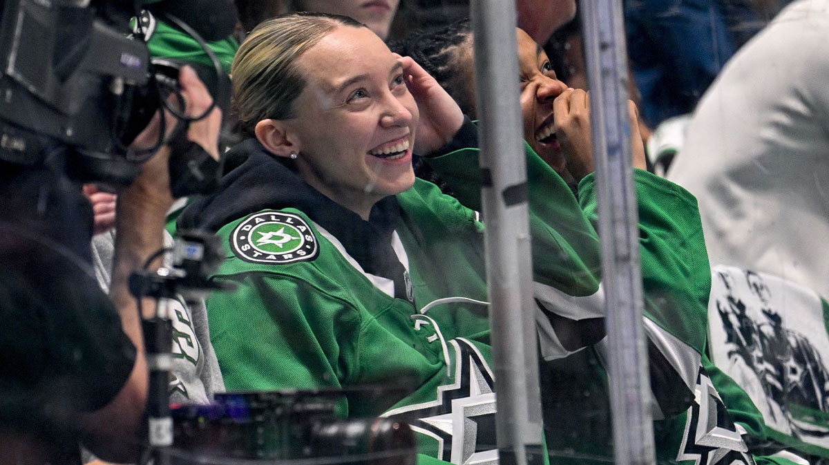 Dallas Wings guard Paige Bueckers watches the game between the Dallas Stars and the Winnipeg Jets during the first period in game four of the second round of the 2025 Stanley Cup Playoffs at American Airlines Center.