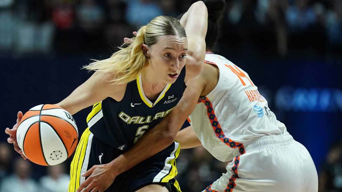 Dallas Wings guard Paige Bueckers (5) drives the ball against Connecticut Sun guard Bria Hartley (14) in the first half at Mohegan Sun Arena.