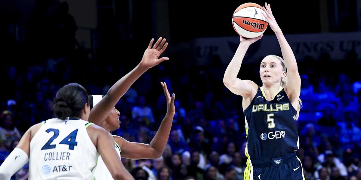 Dallas Wings guard Paige Bueckers (5) shoots over Minnesota Lynx forward Napheesa Collier (24) during the second half at College Park Center.