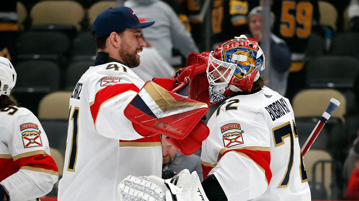 Florida Panthers goaltenders Anthony Stolarz (41) and Sergei Bobrovsky (72) celebrate after defeating the Pittsburgh Penguins at PPG Paints Arena.