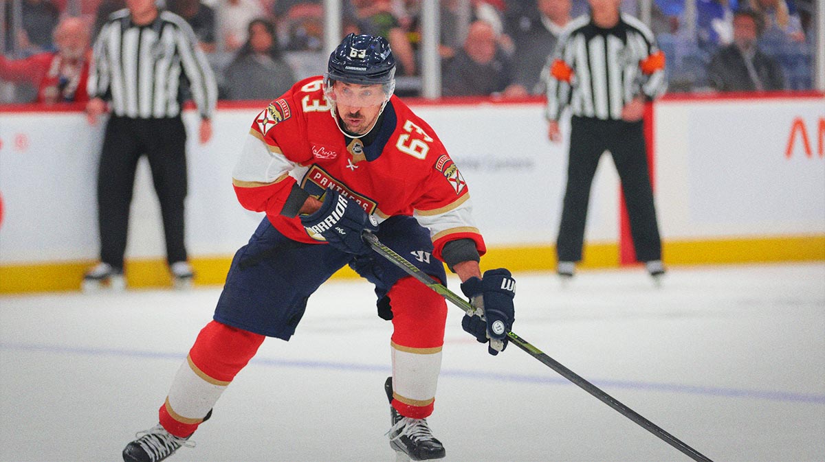 Florida Panthers center Brad Marchand (63) moves the puck against the Toronto Maple Leafs during overtime in game three of the second round of the 2025 Stanley Cup Playoffs at Amerant Bank Arena.