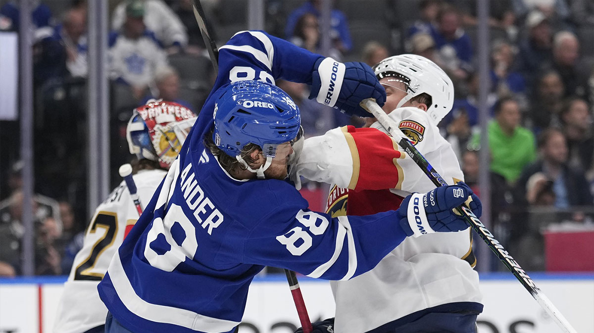 Florida Panthers defenseman Niko Mikkola (77) and Toronto Maple Leafs forward William Nylander (88) battle in front of the net during the third period of game seven of the second round of the 2025 Stanley Cup Playoffs at Scotiabank Arena.