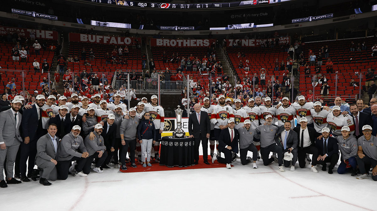 Florida Panthers pose with the Prince of Wales Trophy as they advance to the finals after wining against the Carolina Hurricanes in game five of the Eastern Conference Final of the 2025 Stanley Cup Playoffs at Lenovo Center.