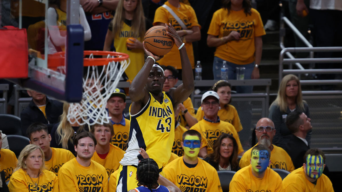 Indiana Pacers forward Pascal Siakam (43) shoots a three point basket over New York Knicks guard Miles McBride (2) during the fourth quarter of game three of the eastern conference finals for the 2025 NBA Playoffs at Gainbridge Fieldhouse.