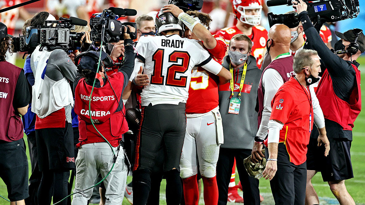 Tampa Bay Buccaneers quarterback Tom Brady (12) greets Kansas City Chiefs quarterback Patrick Mahomes (15) after Super Bowl LV at Raymond James Stadium.