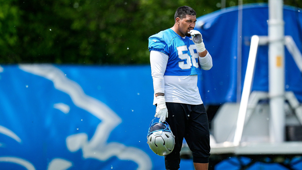 Detroit Lions offensive tackle Penei Sewell (58) watches practice during OTA at Meijer Performance Center in Allen Park on Friday, May 30, 2025.