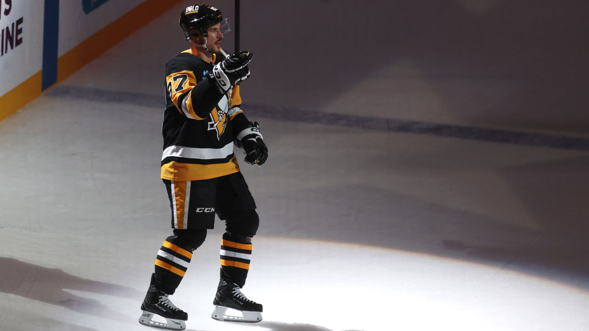 Pittsburgh Penguins center Sidney Crosby (87) reacts after being named a star of the game against the Washington Capitals at PPG Paints Arena.