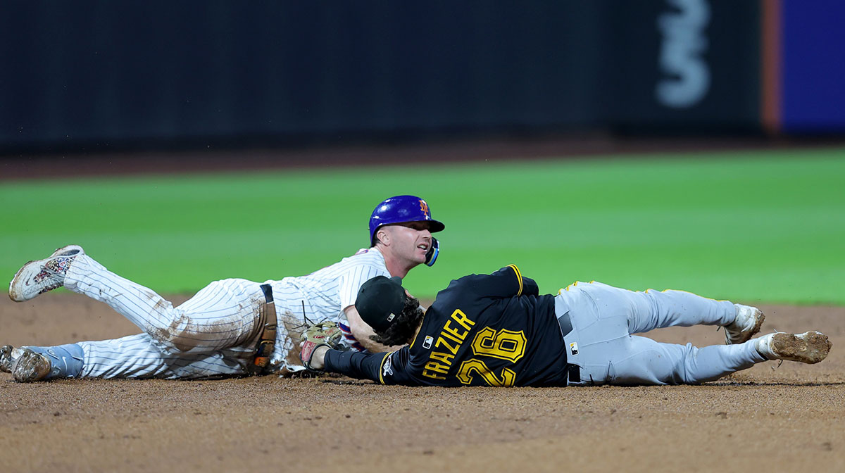 New York Mets first baseman Pete Alonso (20) reacts after being tagged out by Pittsburgh Pirates second baseman Adam Frazier (26) trying to stretch a single into a double during the fifth inning at Citi Field.