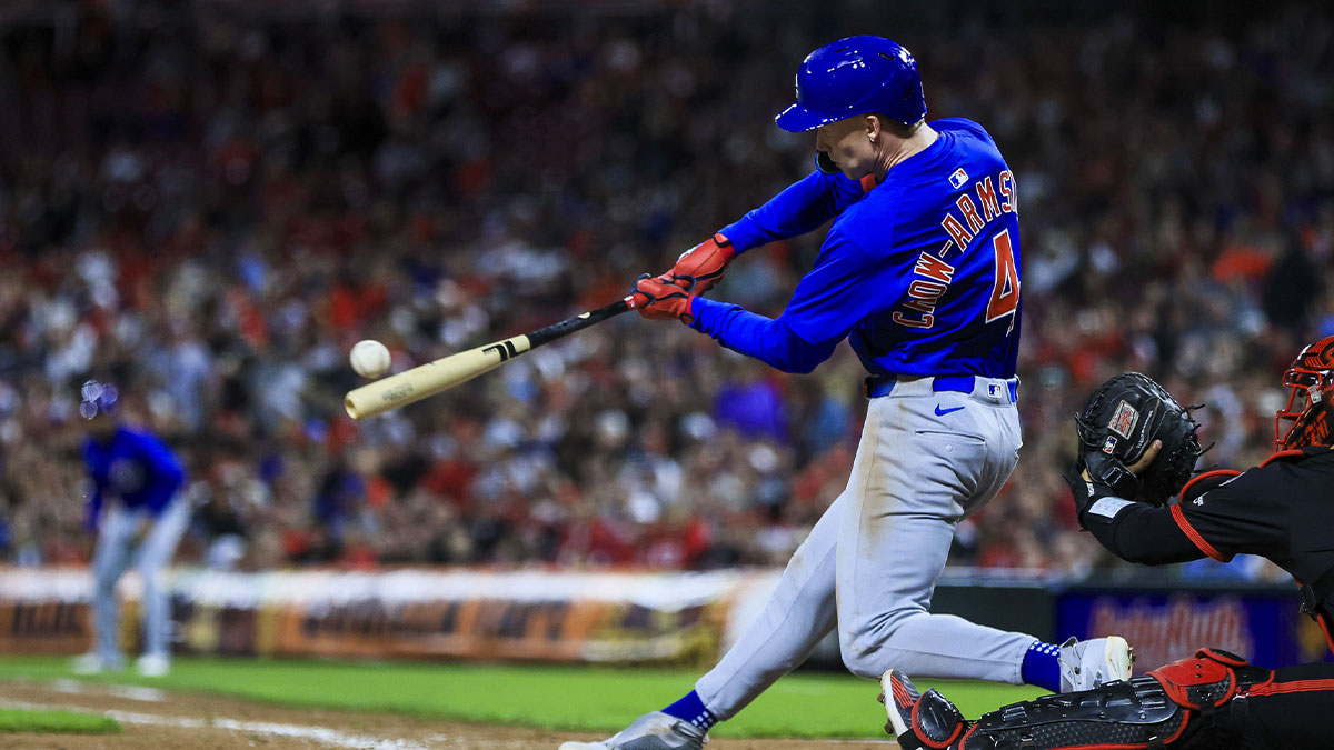 May 23, 2025; Cincinnati, Ohio, USA; Chicago Cubs outfielder Pete Crow-Armstrong (4) hits a grand slam in the seventh inning against the Cincinnati Reds at Great American Ball Park.