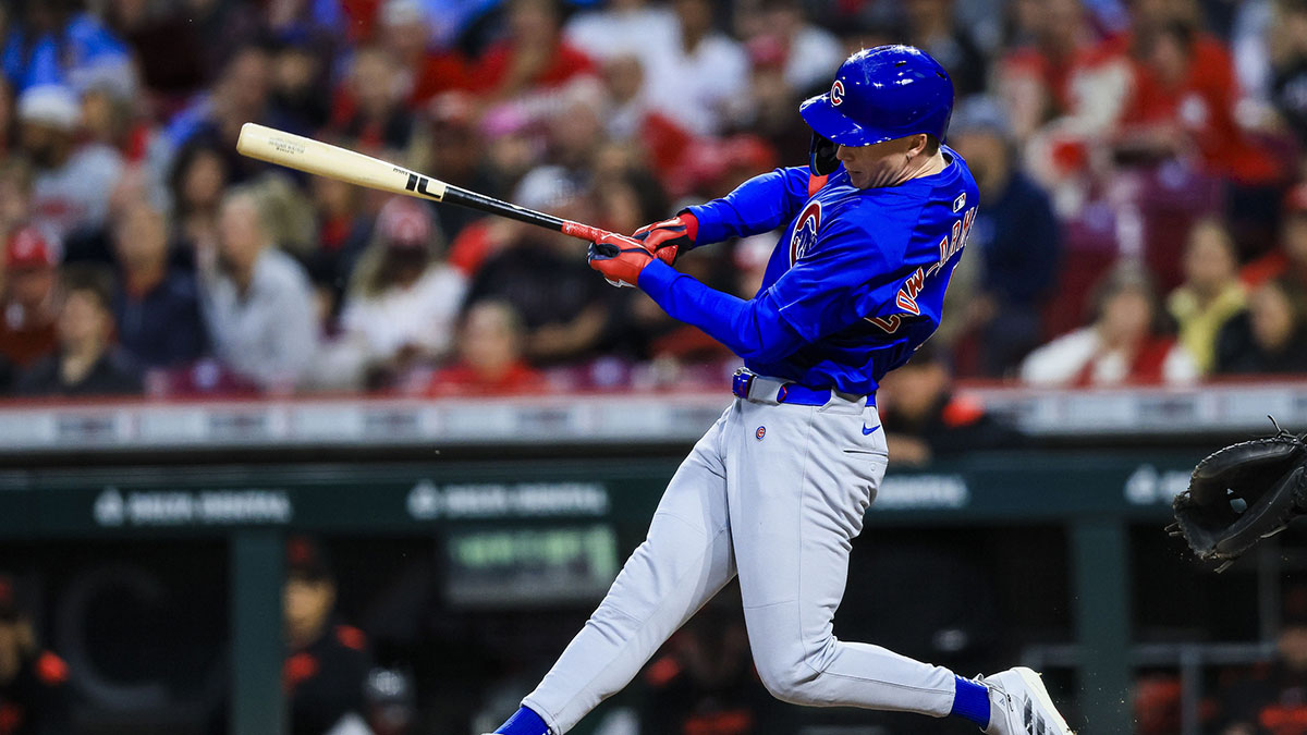 Chicago Cubs outfielder Pete Crow-Armstrong (4) hits a double in the sixth inning against the Cincinnati Reds at Great American Ball Park.