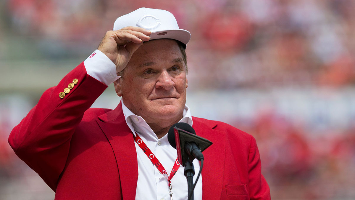 An emotional Cincinnati Reds hall of famer Pete Rose adjusts his cap as he takes the microphone during a pregame ceremony for the unveiling of Pete Rose's bronze statue being installed outside the stadium before the MLB National League game between the Cincinnati Reds and the Los Angeles Dodgers at Great American Ball Park in downtown Cincinnati on Saturday, June 17, 2017.