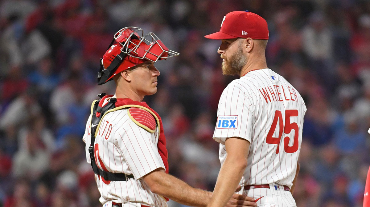 Philadelphia Phillies catcher J.T. Realmuto (10) talks with Philadelphia Phillies pitcher Zack Wheeler (45) against the Washington Nationals at Citizens Bank Park.