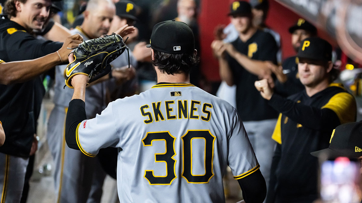 Pittsburgh Pirates pitcher Paul Skenes (30) celebrates with teammates in the dugout against the Arizona Diamondbacks in at Chase Field.