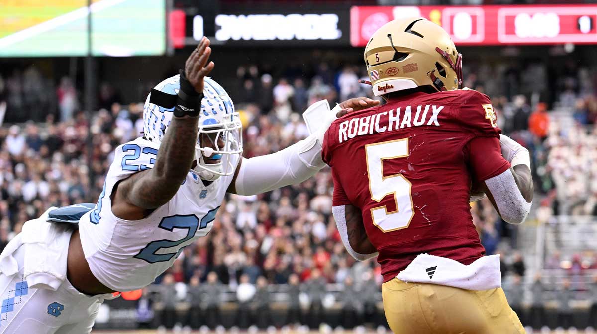 North Carolina Tar Heels linebacker Power Echols (23) tackles Boston College Eagles running back Kye Robichaux (5) during the first half at Alumni Stadium.