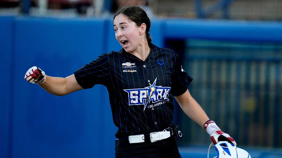 OKC's Riley Ludlam celebrates a score during a professional softball game between the Oklahoma City Spark and Great Britain at Devon Park in Oklahoma City, Thursday, Jan., 18, 2024. MLB