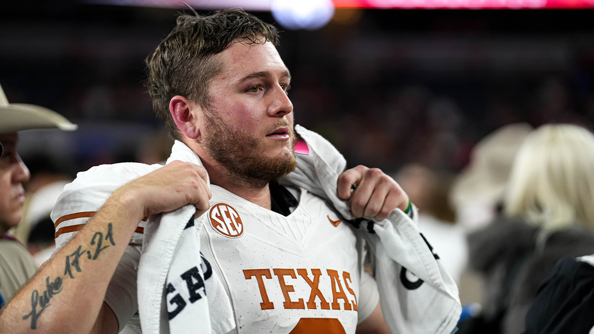 Texas Longhorns quarterback Quinn Ewers (3) looks into the crowd after the 28-14 loss to Ohio State in the College Football Playoff semifinal game in the Cotton Bowl at AT&T Stadium