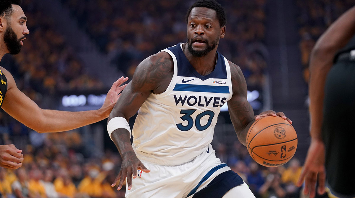 Minnesota Timberwolves forward Julius Randle (30) dribbles the ball against the Golden State Warriors in the first quarter during game four of the second round for the 2025 NBA Playoffs at Chase Center.