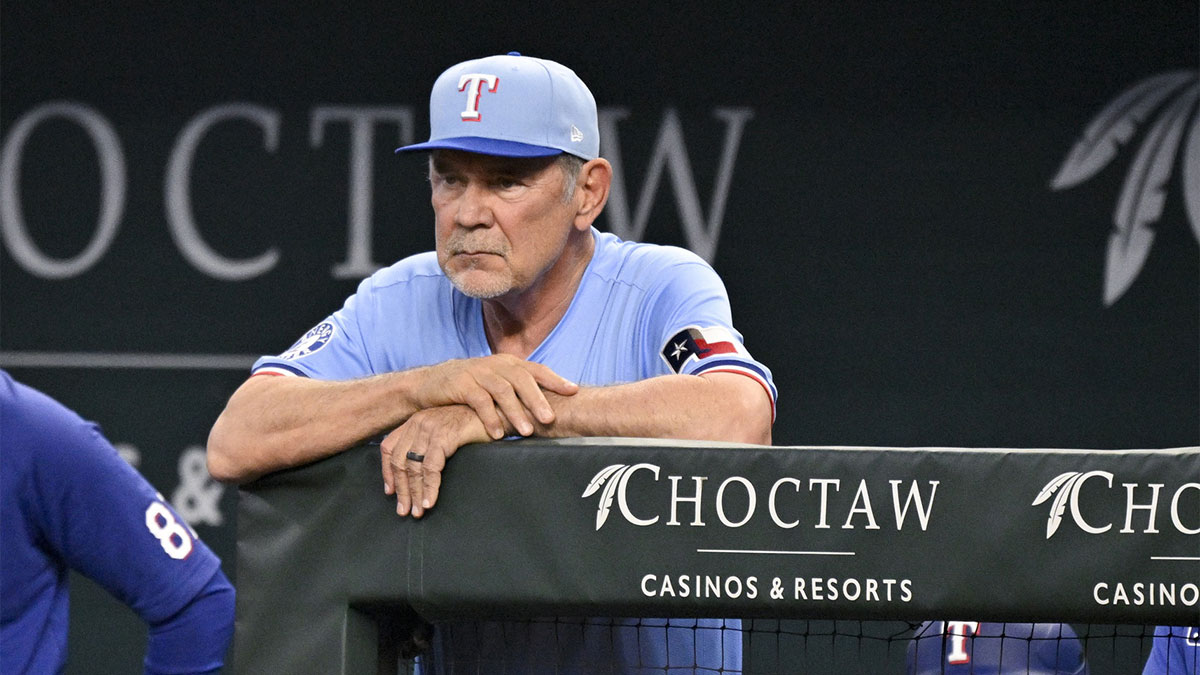 Texas Rangers manager Bruce Bochy (15) looks on from the dugout during the seventh inning against the Los Angeles Dodgers at Globe Life Field.