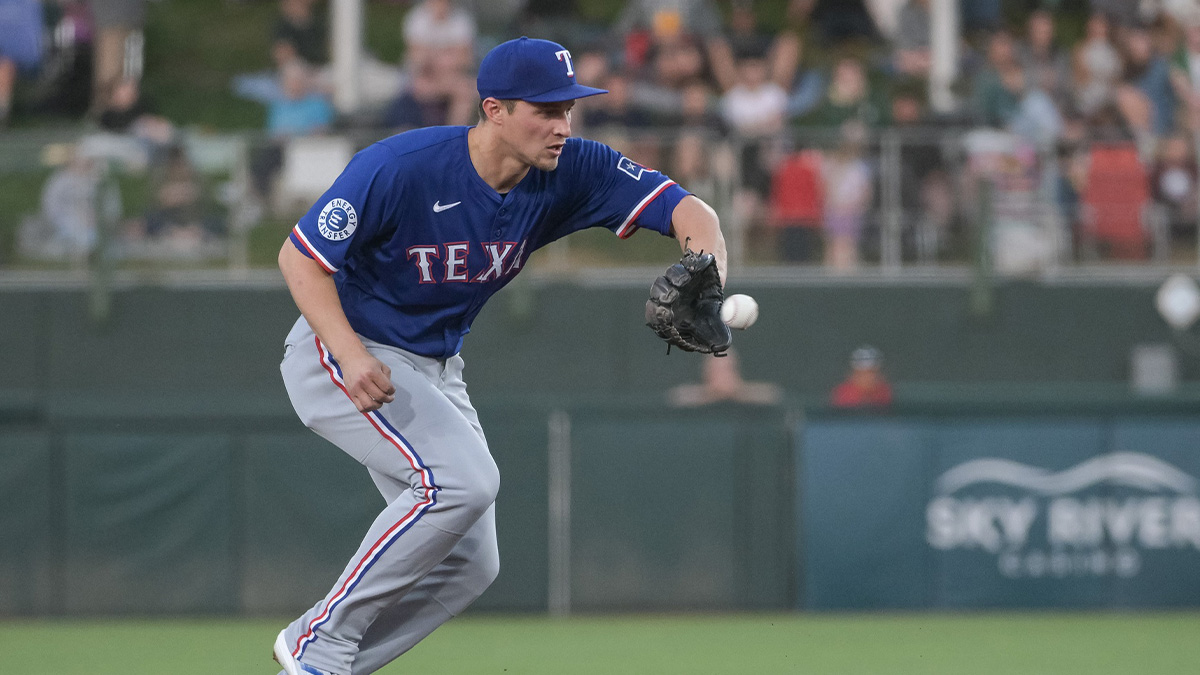 Texas Rangers shortstop Corey Seager (5) fields the ball during the second inning of the game against the Athletics at Sutter Health Park.