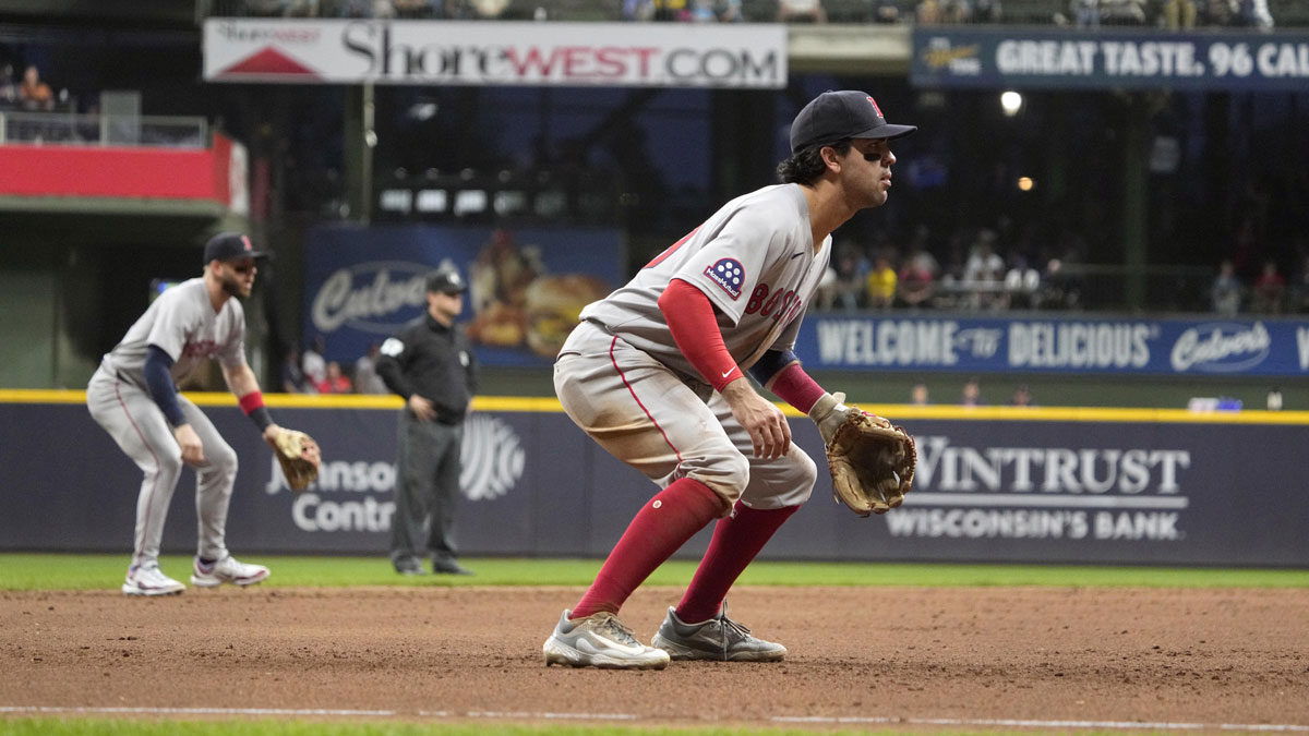 Boston Red Sox shortstop Marcelo Mayer (39), right and Boston Red Sox shortstop Trevor Story (10) prepare for a hit against the Milwaukee Brewers in the seventh inning at American Family Field.