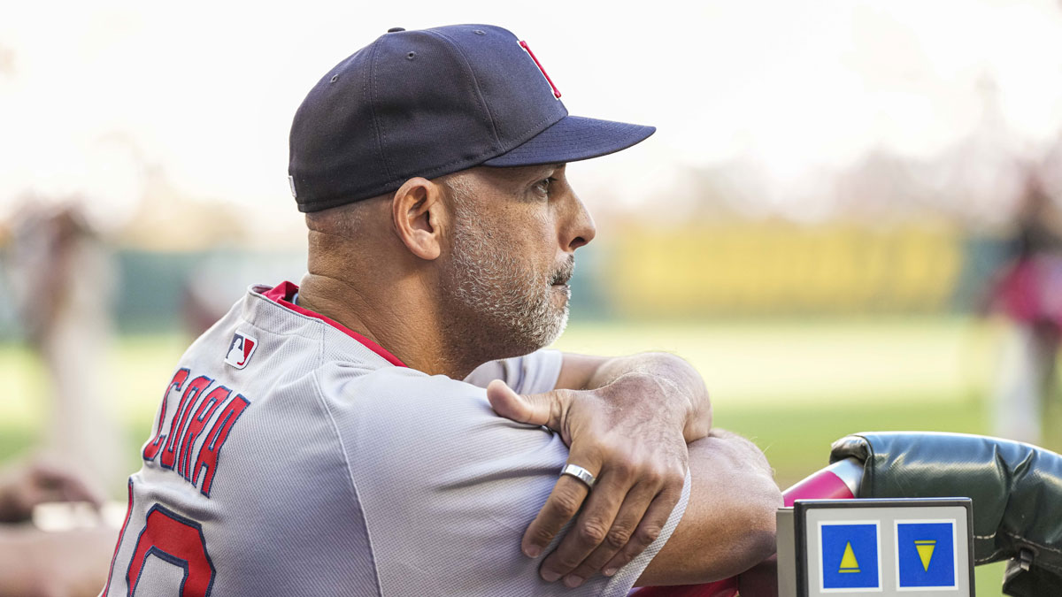 Boston Red Sox manager Alex Cora (13) in the dugout against the Atlanta Braves during the first inning at Truist Park.