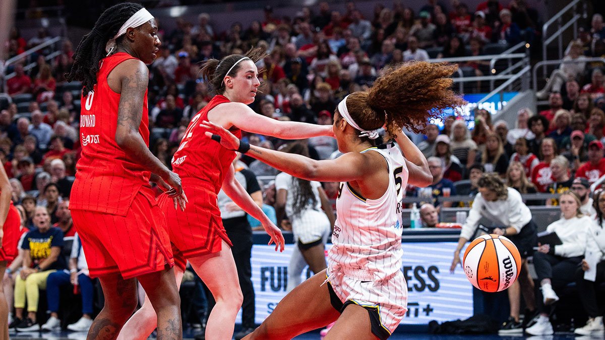 Indiana Fever guard Caitlin Clark (22) fouls Chicago Sky forward Angel Reese (5) in the second half at Gainbridge Fieldhouse.