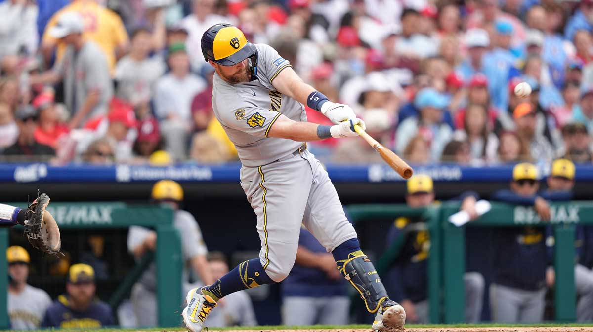 May 31, 2025; Philadelphia, Pennsylvania, USA; Milwaukee Brewers infielder Rhys Hoskins (12) hits a three-run home run against the Philadelphia Phillies in the fourth inning at Citizens Bank Park. Mandatory Credit: Kyle Ross-Imagn Images